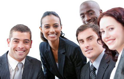 Multi-ethnic business people smiling at the camera in a meeting