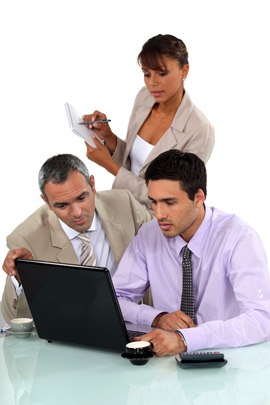 Sales team working on laptop